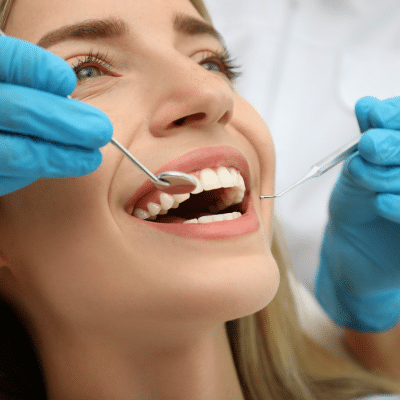 Woman smiling at the dentist, representing cosmetic dentistry
