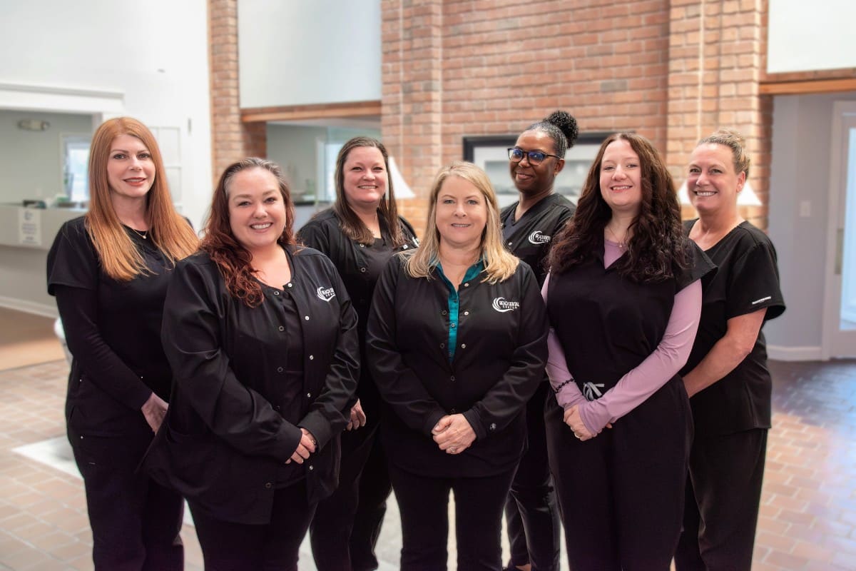 Beach-dental-center-updated-group-admin-photo Beach dental center administrative team providing friendly patient support at the virginia beach dental office.